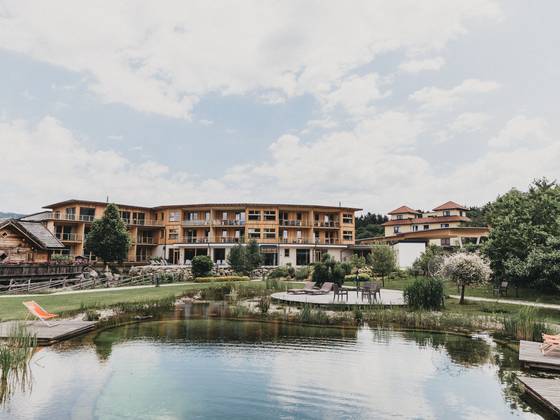 Wooden hotel with natural bathing lake in the Viennese Alps