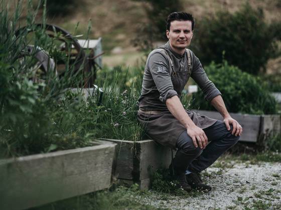 Peter in the Molzbachhof herb garden