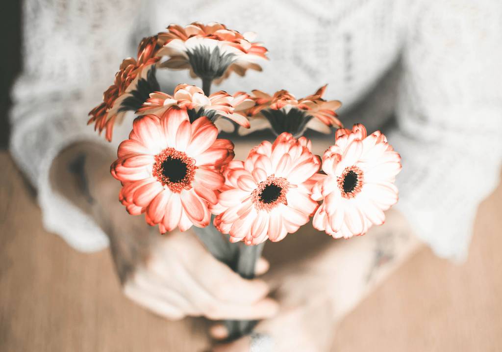 Bouquet of flowers is held at the Naturhotel Molzbachhof.