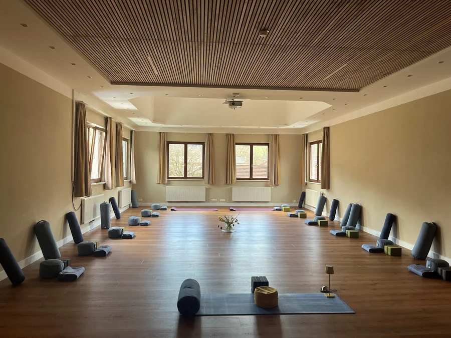 Yoga equipment in the large seminar room at the Naturhotel Molzbachhof.
