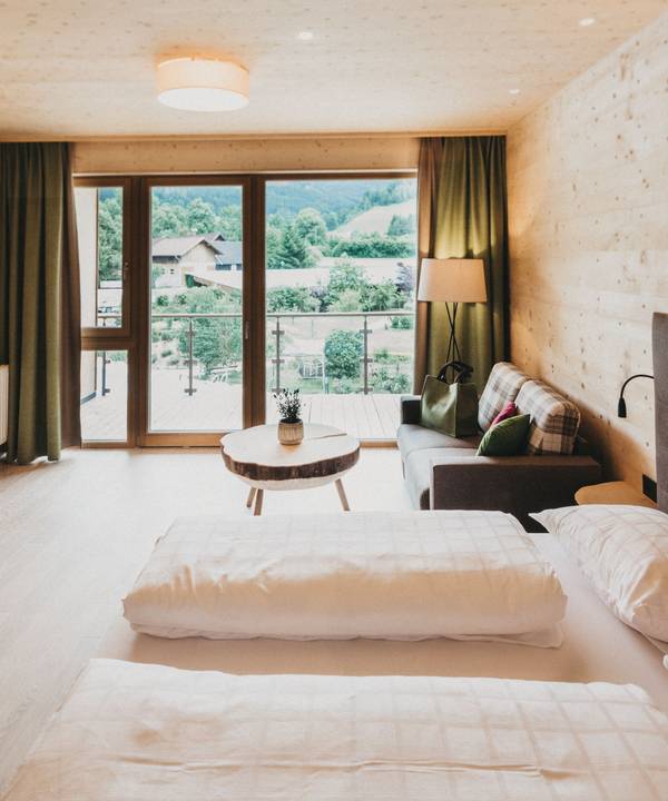 Room Baumgeflüster at the Holzhotel Molzbachhof
